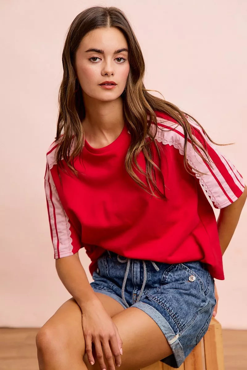 Red blush BiBi French Terry short sleeve top with side lace detail from Trendsi, casual and comfortable with stylish accents.