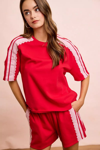 Red blush BiBi French Terry short sleeve top with side lace detail from Trendsi.