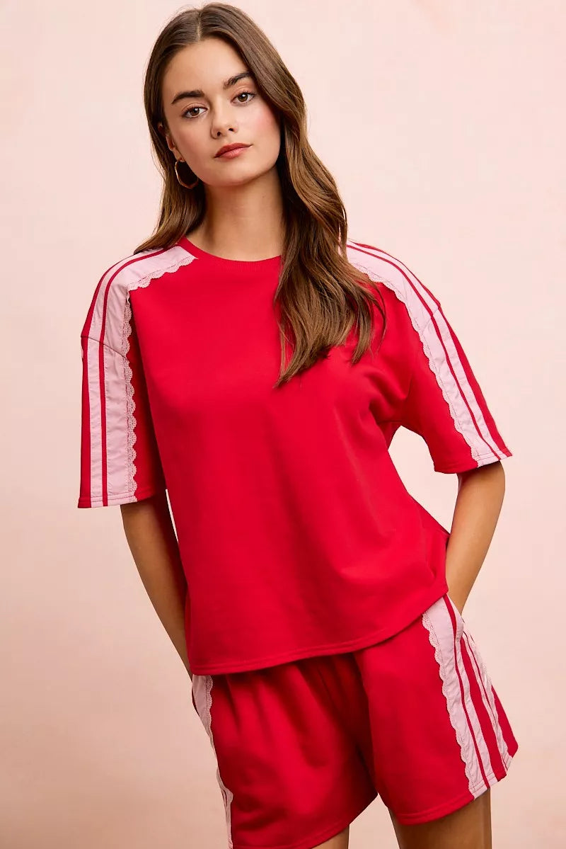Red blush BiBi French Terry short sleeve top with side lace detail, casual and stylish for everyday wear.