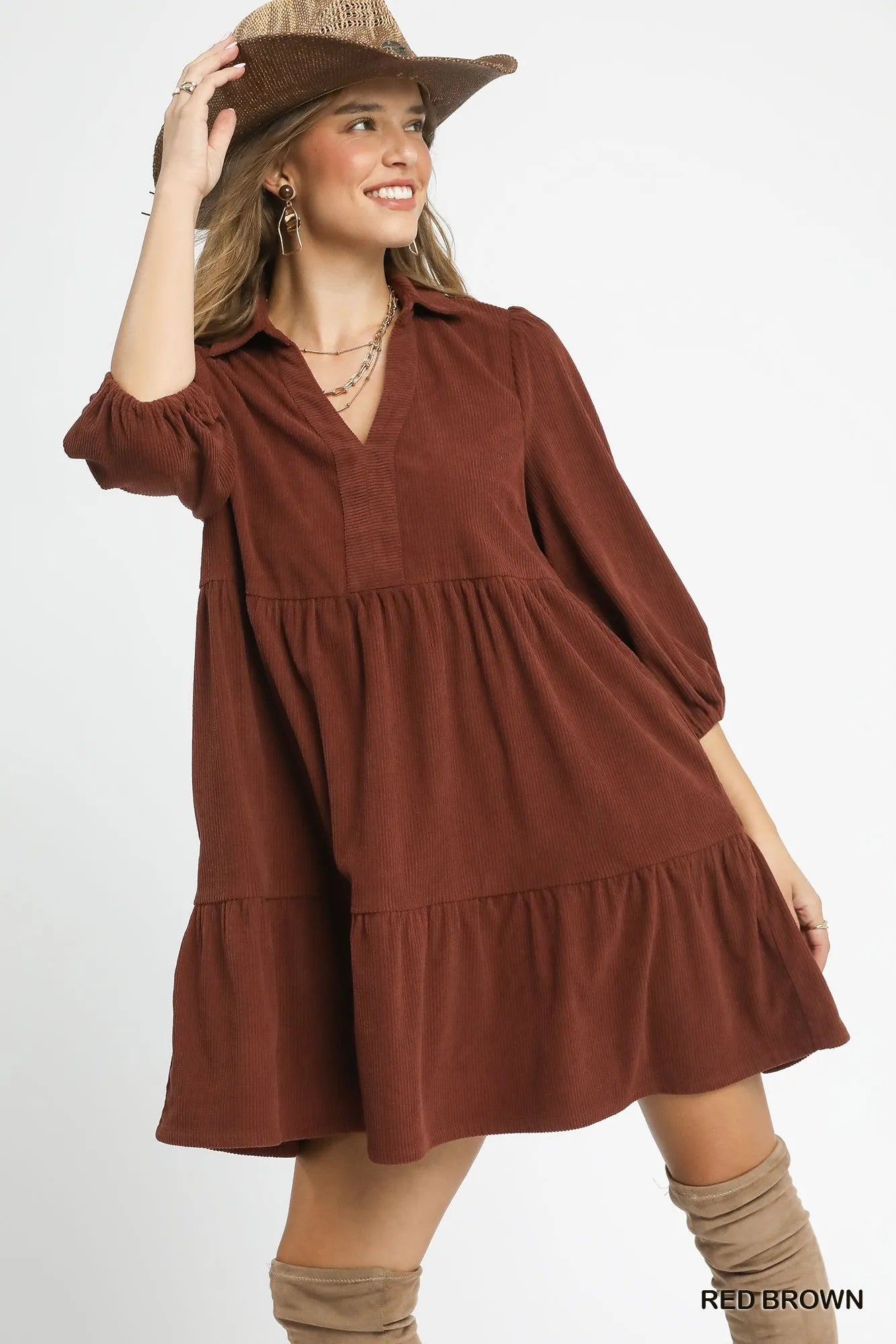 Red-brown Umgee tiered corduroy mini dress with balloon sleeves, featuring a stylish and comfortable design.