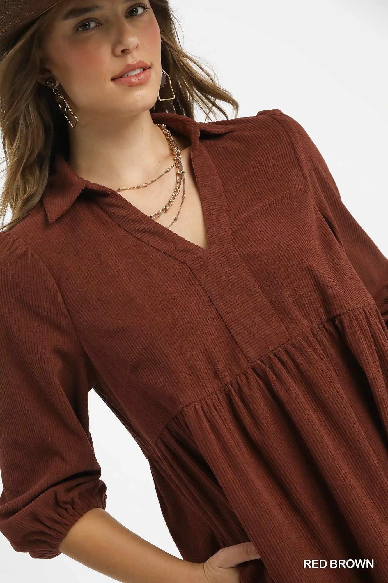 Red-brown Umgee tiered corduroy mini dress with balloon sleeves, featuring a stylish, layered design and vintage-inspired look.