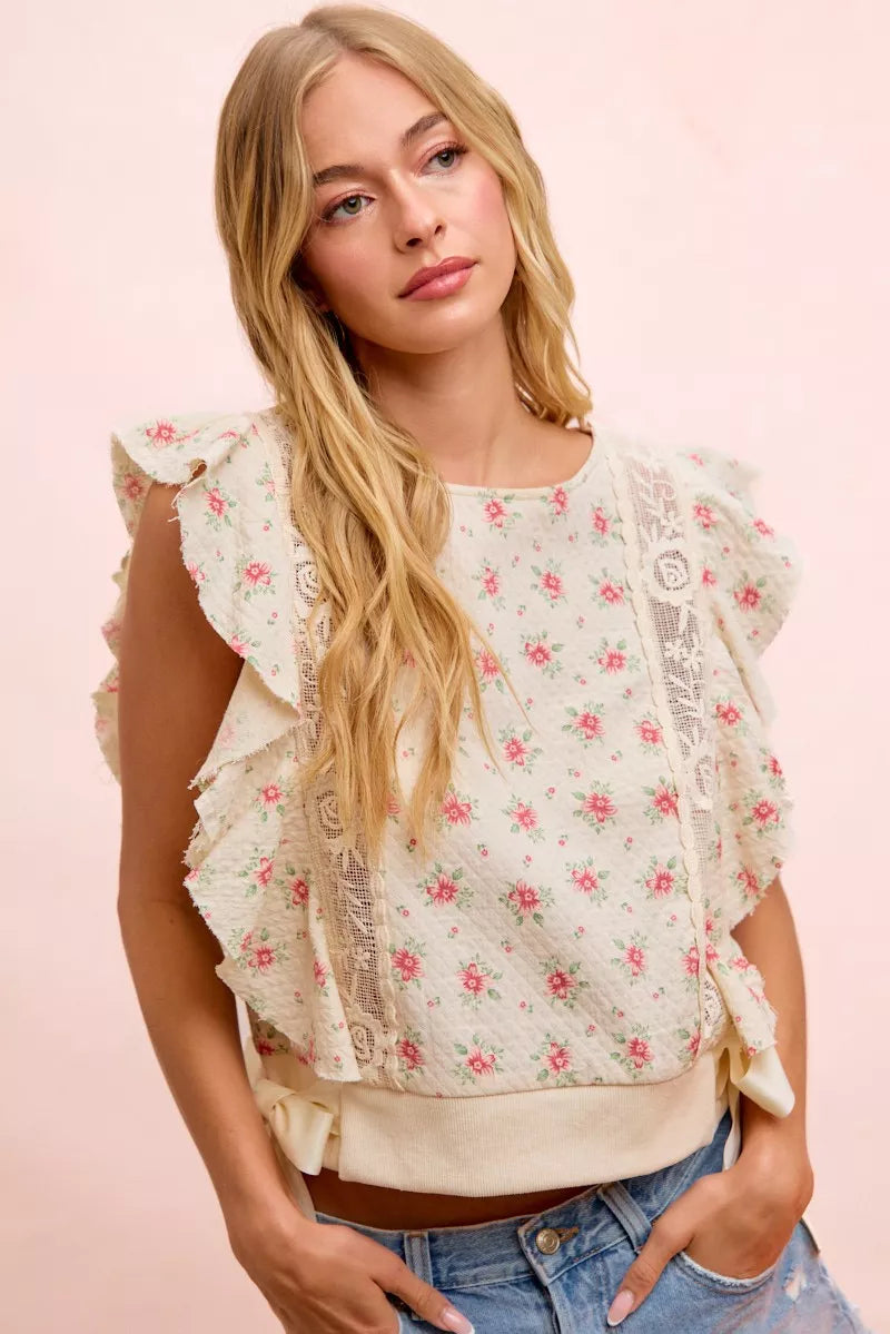 Red floral printed top with ruffle sleeves and trim detail from Trendsi, featuring a feminine, stylish design.