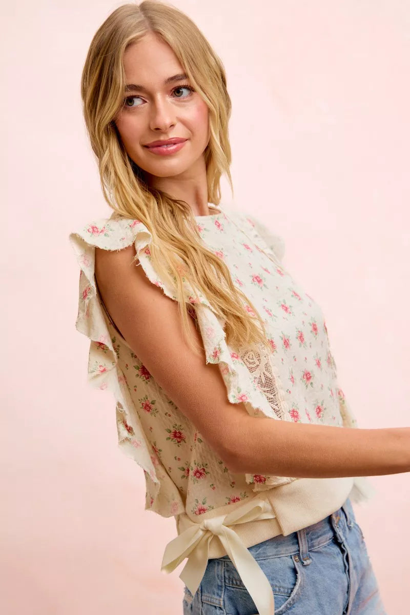Red floral printed top by Trendsi featuring ruffle sleeves and trim detail, casual stylish blouse for women.