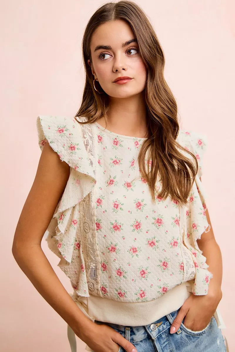 Red floral printed top with ruffle sleeves and trim detail, stylish blouse from Trendsi.