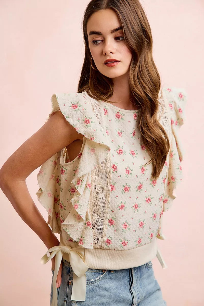 Red BiBi flower printed top with ruffle sleeves and trim detail, stylish women's blouse from Trendsi.