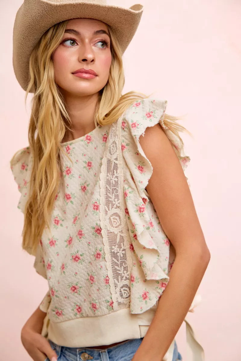 Red floral printed ruffle sleeve top with trim detail from Trendsi, featuring a feminine and stylish design.