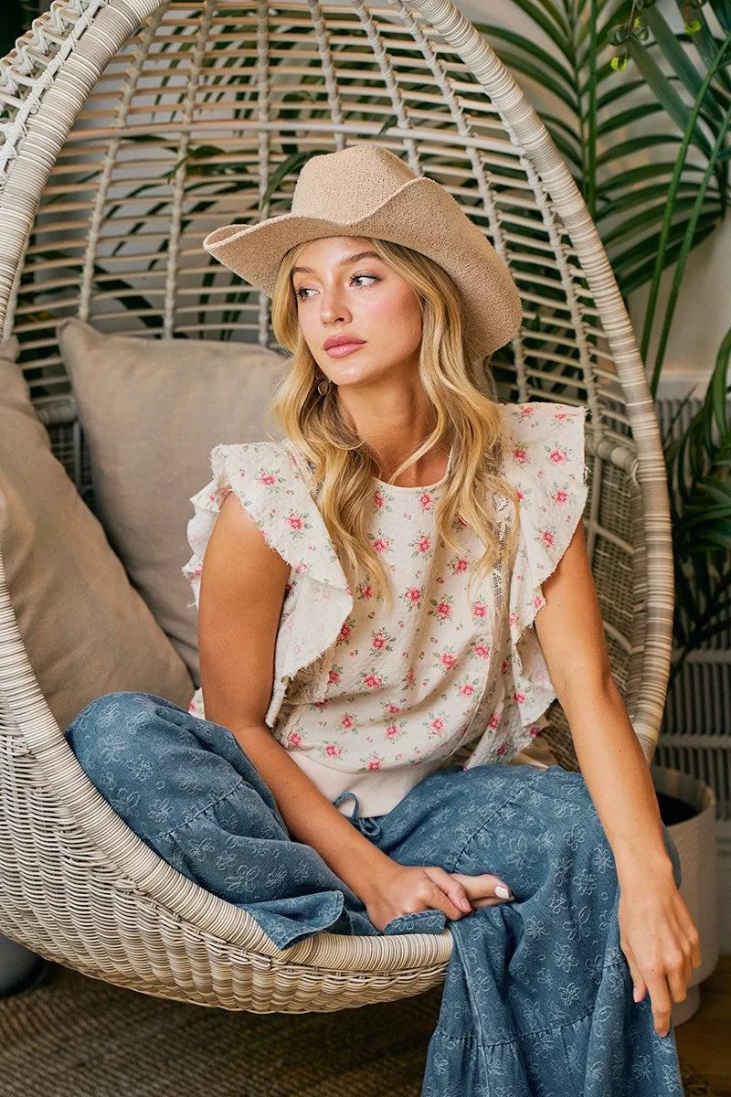 Red floral printed top with ruffle sleeves and trim detail by Trendsi, showcasing a feminine and stylish design.