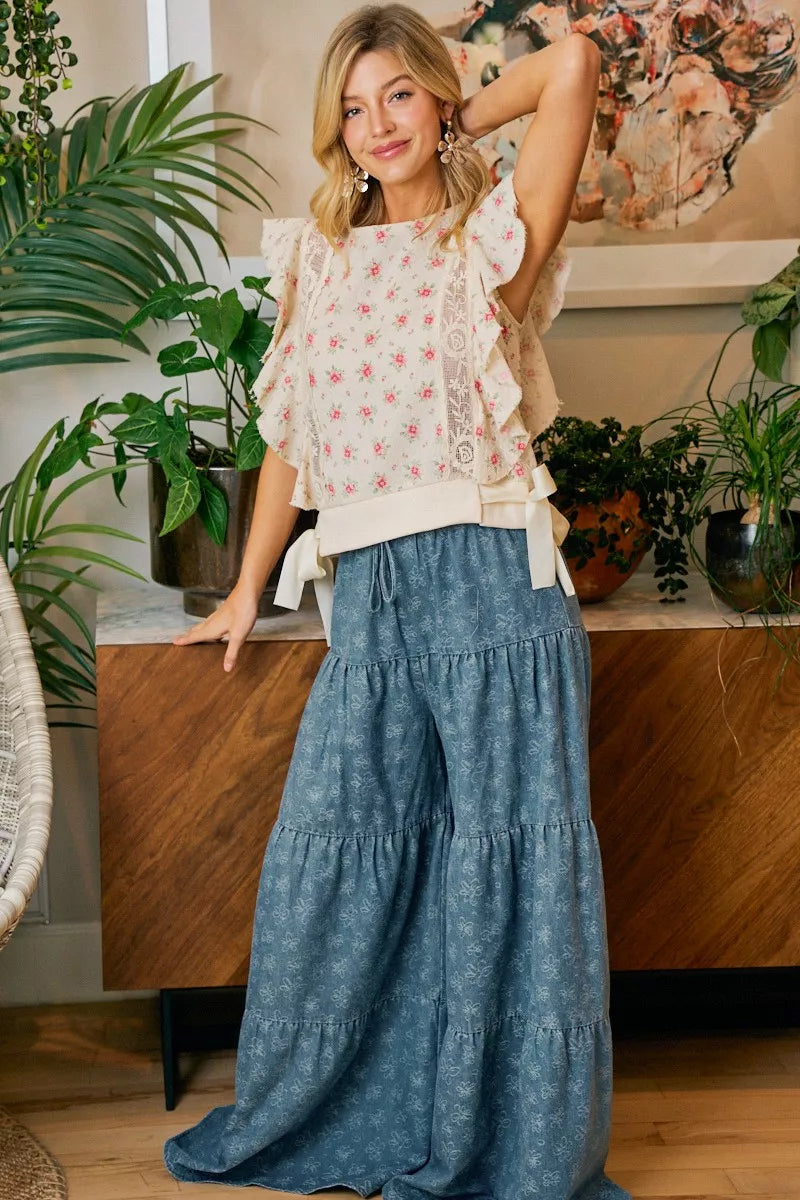 Red BiBi flower printed top with ruffle sleeves and trim detail, stylish casual blouse from Trendsi.