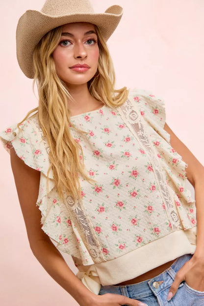 Red floral printed top with ruffle sleeves and trim detail from Trendsi, showcasing a feminine and stylish blouse.