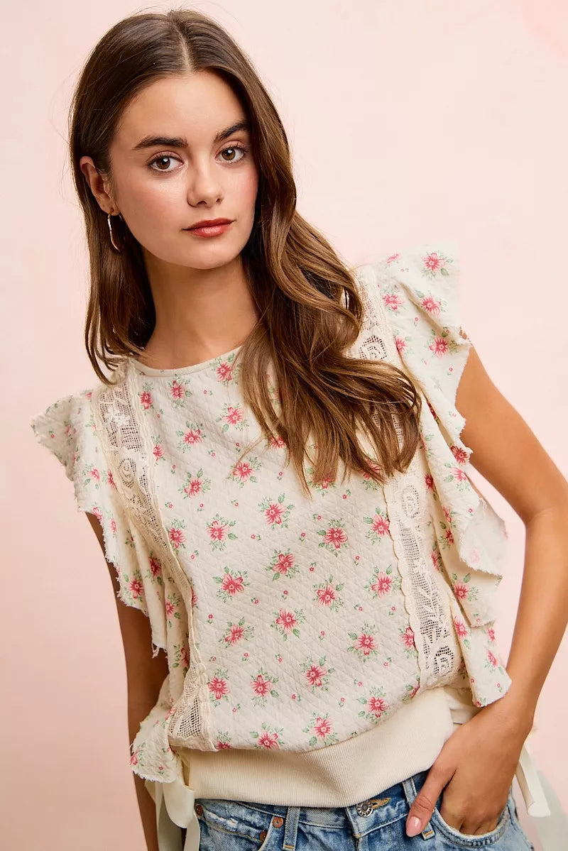 Red floral printed top with ruffle sleeves and trim detail from Trendsi, featuring a feminine, stylish design.
