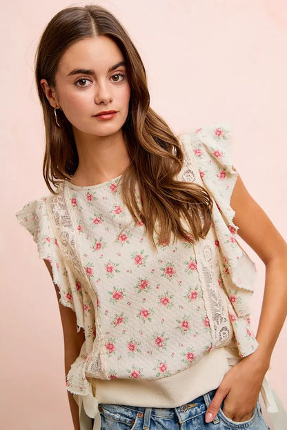 Red floral printed top with ruffle sleeves and trim detail from Trendsi, featuring a feminine, stylish design.