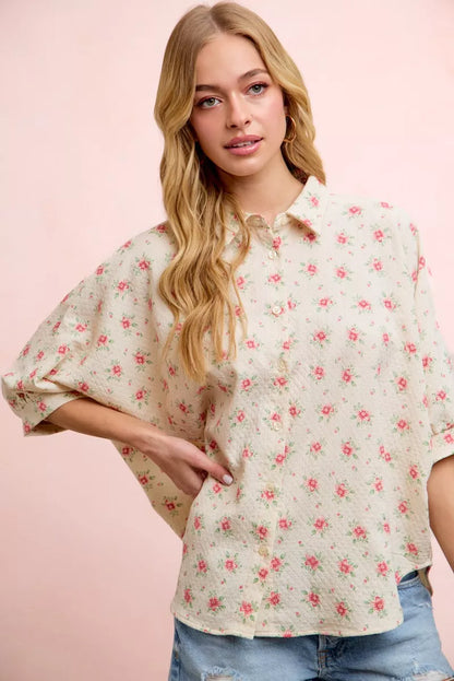 Red BiBi flower printed short dolman blouse top by Trendsi, featuring a relaxed fit and vibrant floral design.