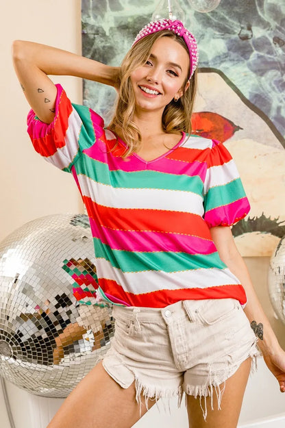 Trendi red, fuchsia, and green multi-striped puff sleeve V-neck top with colorful print and stylish design.