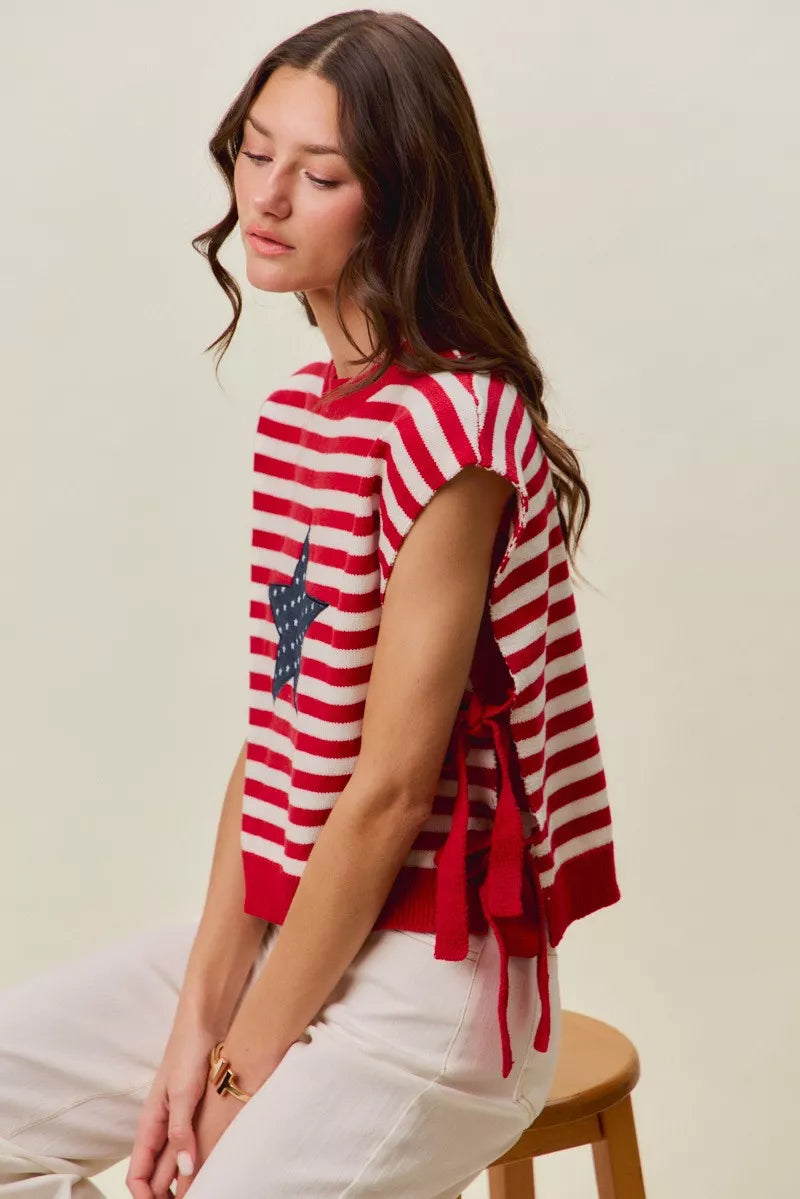 Red and ivory SO ME Stripe Star Patch 4th of July side tie vest top by Trendsi, featuring patriotic star patch design.
