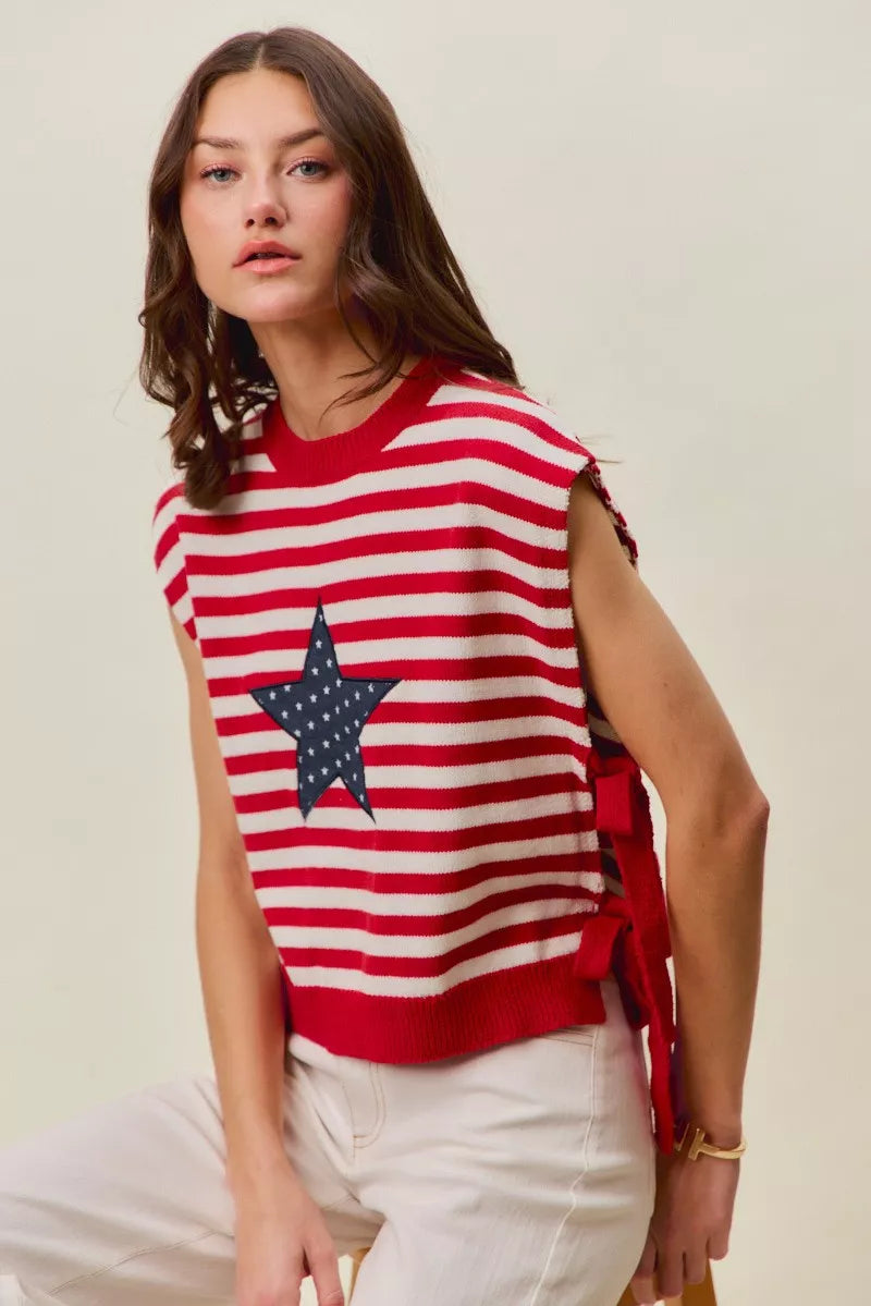 Red and ivory stripe SO ME Star Patch 4th of July tie-front vest top by Trendsi, featuring patriotic star patches and side ties.