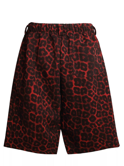 Men's leopard print casual capris from Trendsi featuring a red and black animal pattern and comfortable fit.