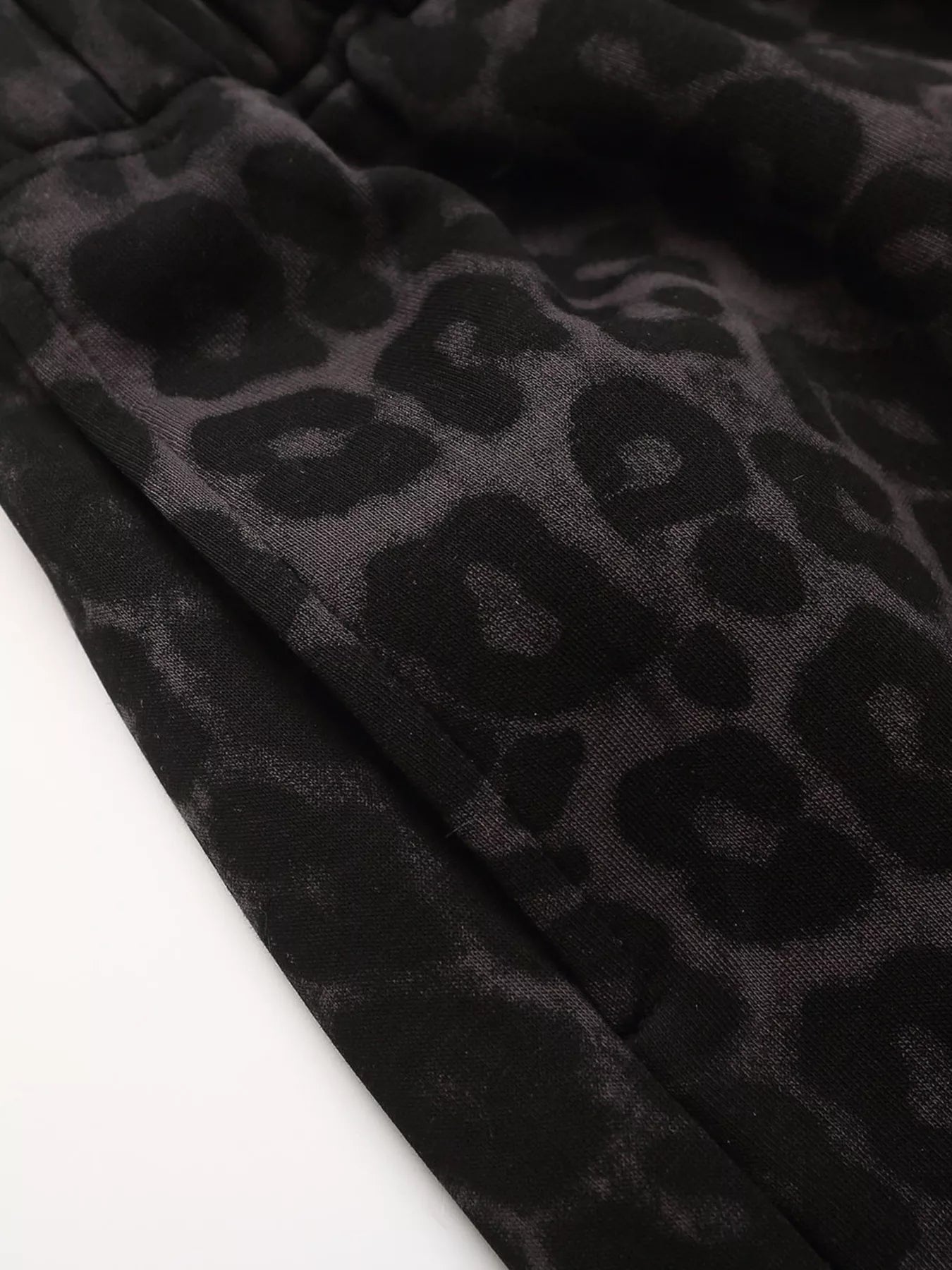 Men's leopard print casual capris by Trendsi, featuring a stylish red pattern and comfortable fit, perfect for everyday wear.