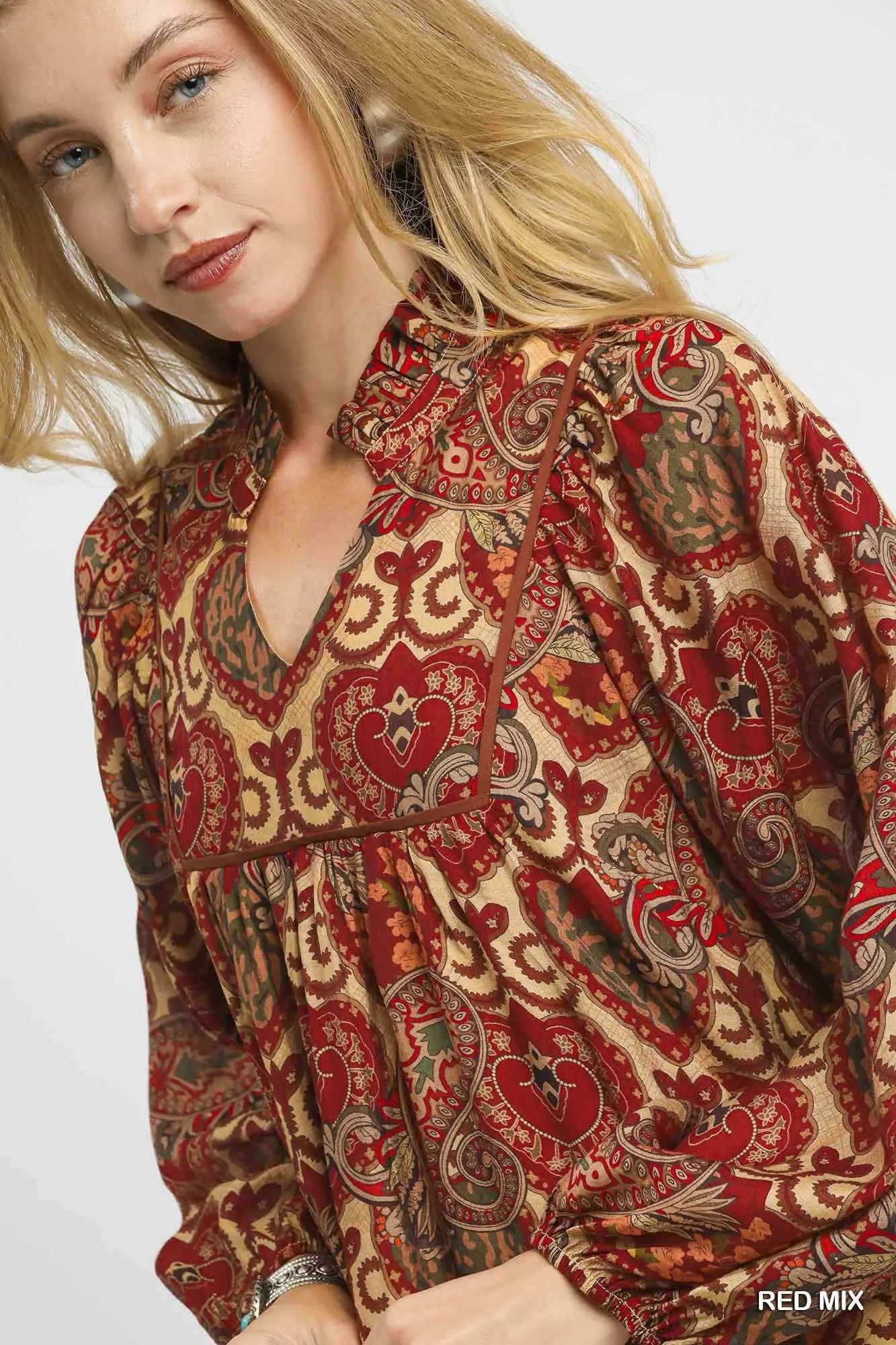 Red Umgee Boho Mix Paisley Babydoll Dress with flowy silhouette and bohemian style, featuring paisley patterns and relaxed fit.