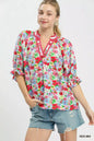 Red floral print ruffle top by Umgee with mixed floral pattern and feminine ruffle details, perfect for casual or dressy occasions.