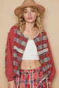 Red multi-color plaid long sleeve shirt with a round neck from Trendsi, shown on a model.