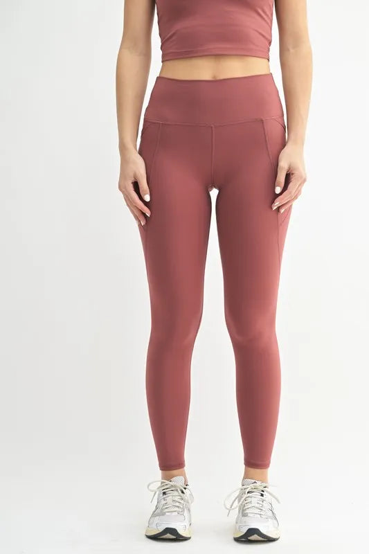 Light blue high-waisted leggings from MONO B Venice Cloud Light Sculpt collection, featuring a sleek, sculpting fit and comfortable fabric.