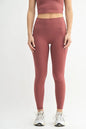 Light blue high-waisted leggings from MONO B Venice Cloud Light Sculpt collection, featuring a sleek, sculpting fit and comfortable fabric.