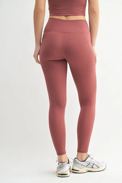Red MONO B Venice Cloud Light Sculpt high-waisted leggings with a sleek fit and sculpting design, ideal for active wear.