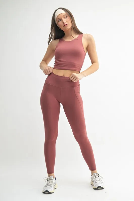 Red MONO B Venice Cloud Light Sculpt high-waisted leggings with a sleek fit and comfortable stretch, designed for active wear.