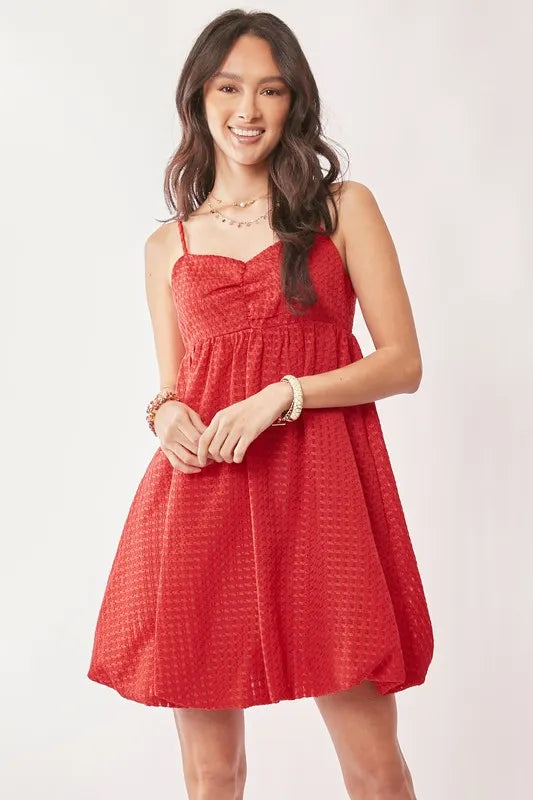 Red Davi & Dani textured sweetheart neckline bubble hem dress, featuring a fitted bodice and playful skirt, by Trendsi.