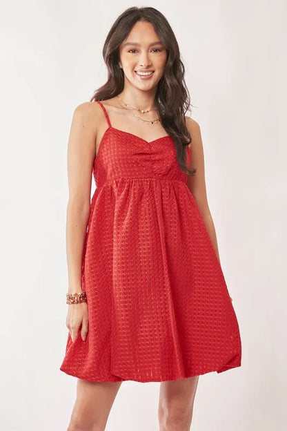 Red Davi & Dani textured sweetheart neckline bubble hem dress with short sleeves, stylish and feminine for special occasions.