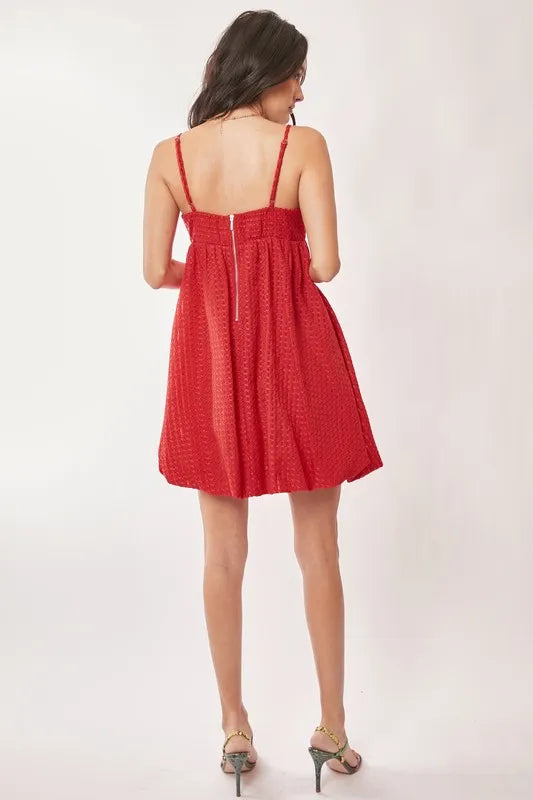 Red Davi & Dani textured sweetheart neckline bubble hem dress from Trendsi, featuring a fitted bodice and playful hem detail.