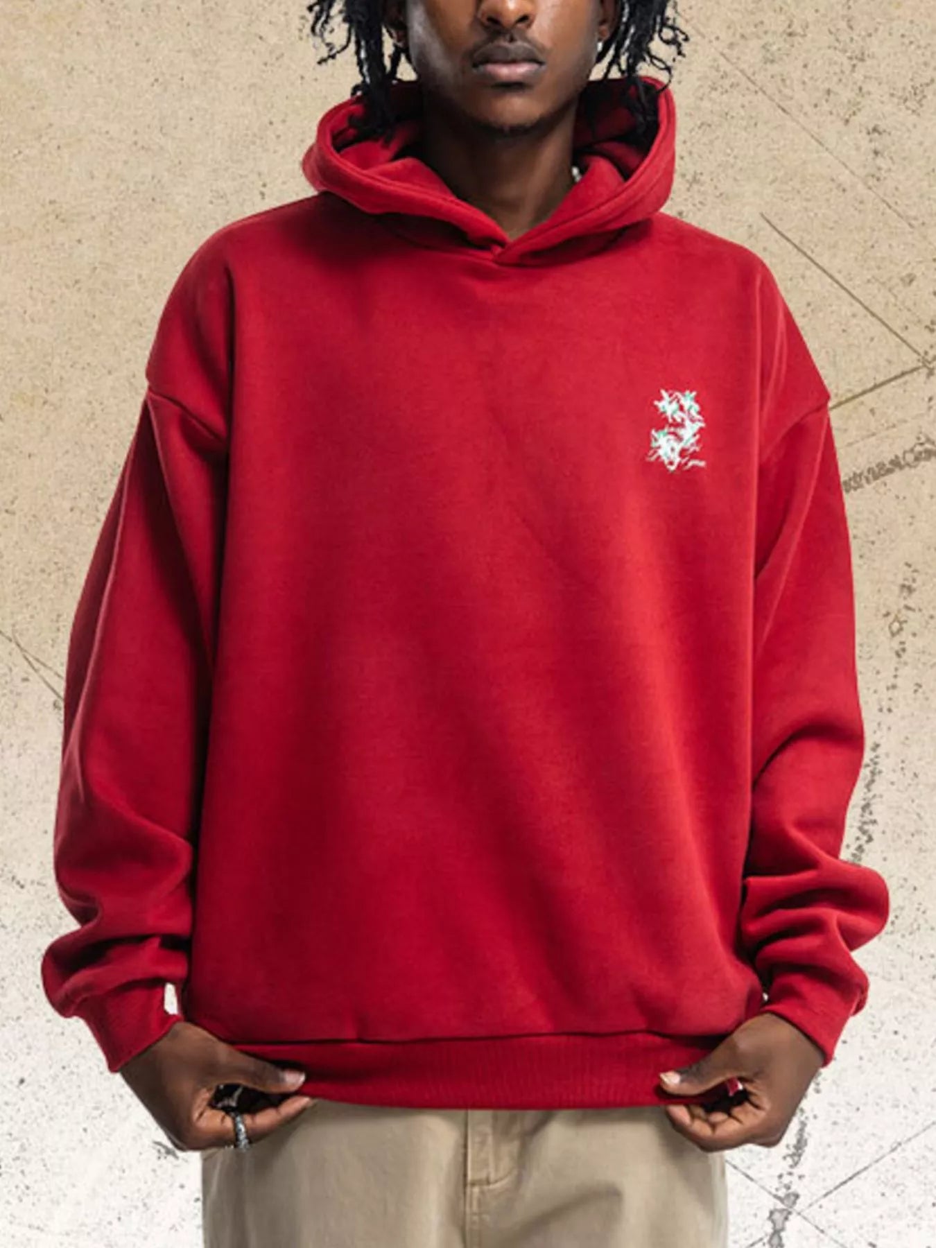 Men's red graphic back long sleeve hoodie by Trendsi, featuring bold design on the back and comfortable fit.
