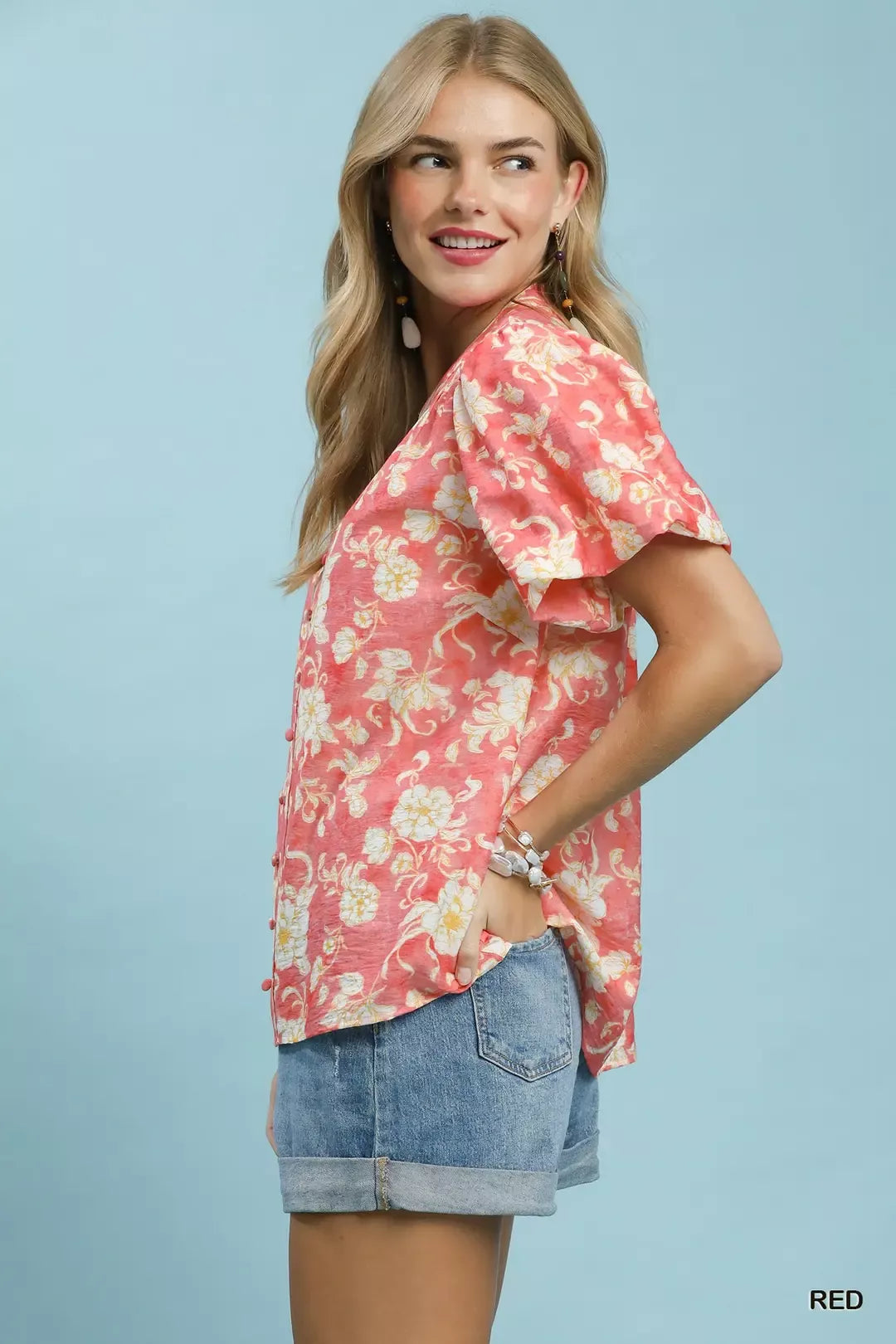 Red Umgee floral button-front short sleeve shirt with a relaxed fit and vibrant floral pattern, perfect for casual wear.
