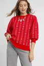 Red Umgee Jacquard Knit Puff Sleeve Sweater with intricate pattern and cozy fit, perfect for stylish winter wear.