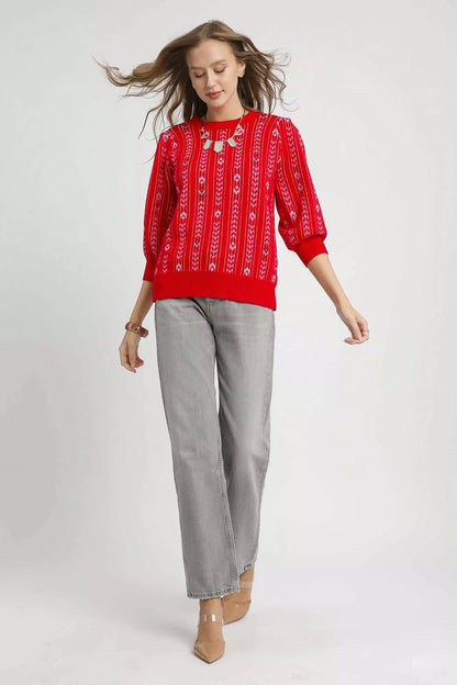 Red Umgee Jacquard Knit Puff Sleeve Sweater featuring intricate knit pattern and stylish puff sleeves.