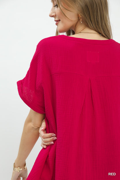 Red Umgee textured gauze boho blouse with a split neck and relaxed fit, styled for casual or bohemian looks.