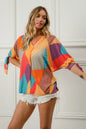 BiBi multi stripe block printed jersey blouse with tied sleeves in red, yellow, and green, styled with a casual fit.