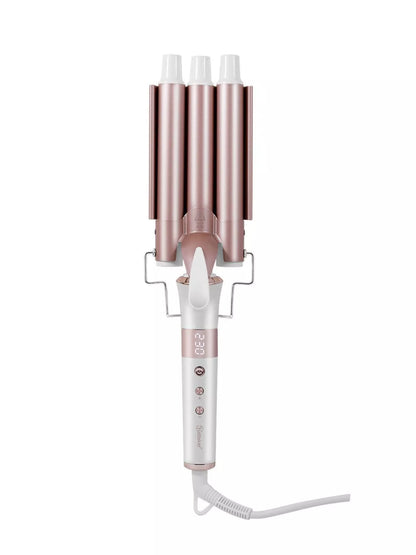 Rose gold Trendsi 3-barrel hair curling iron with European plug, showing the professional styling tool for creating beach waves and curls.