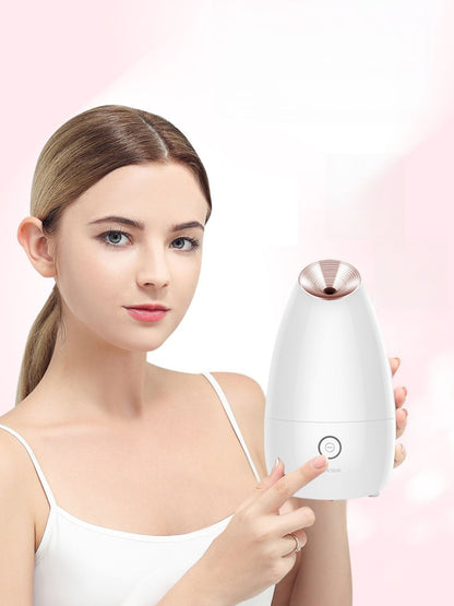 Rose gold facial steamer deep cleansing beauty device by Trendsi, showing the compact, sleek design for skincare and pore cleansing.