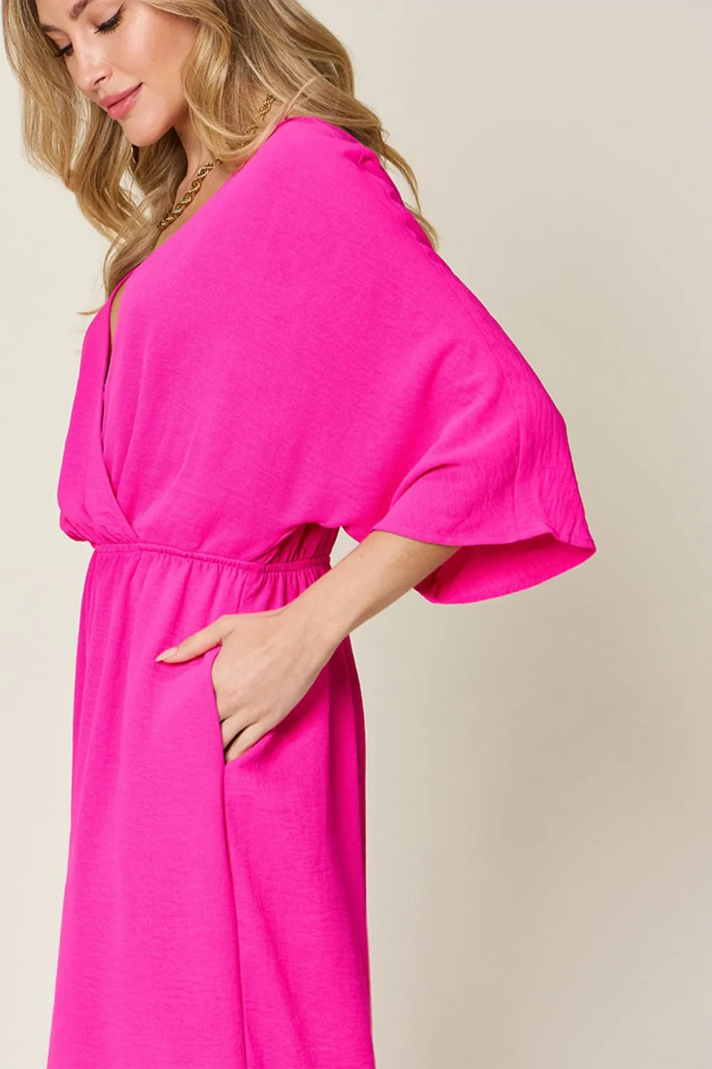 Royal blue Trendsi Double Take full-size surplice jumpsuit with wide-leg design and pockets, stylish and comfortable for everyday wear.