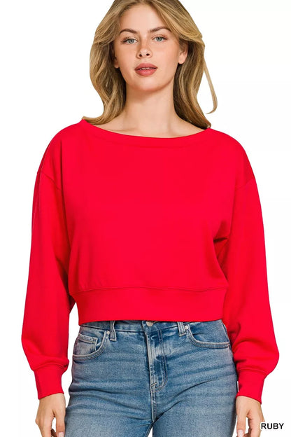 Zenana scuba cropped boat neck sweatshirt from Trendsi, featuring a relaxed fit and comfortable fabric in a stylish pullover design.