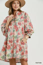 Rust Umgee floral print mini dress with smocked cuffs, featuring a mix of vibrant floral patterns and a stylish, fitted silhouette.