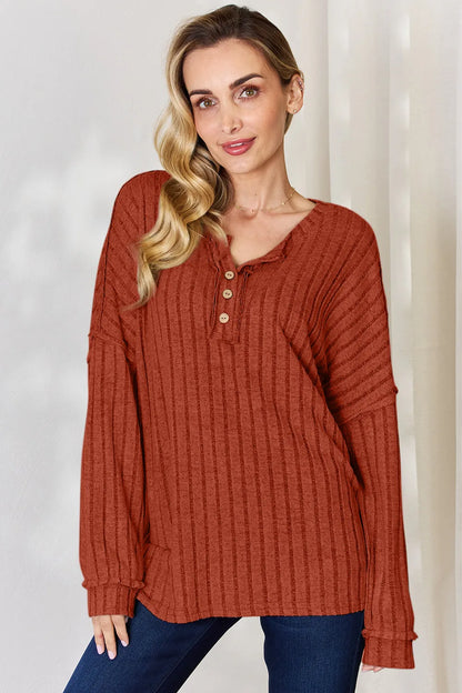 Rust-colored Trendsi Basic Bae full-size ribbed long sleeve T-shirt with half button detail, casual and comfortable fit.