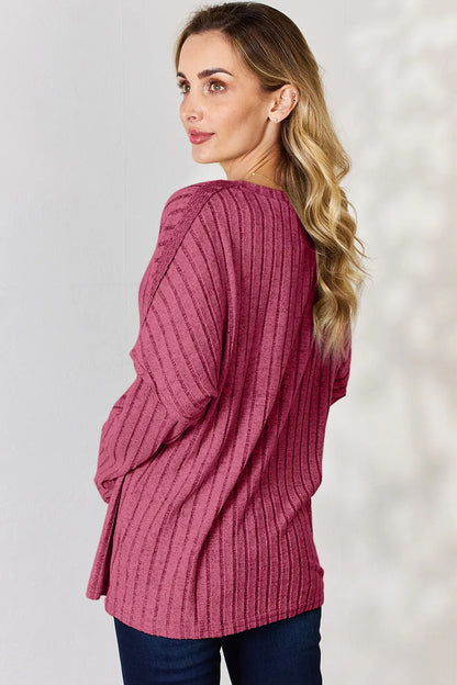 Rust-colored Basic Bae full-size ribbed long sleeve T-shirt with half button detail, from Trendsi.