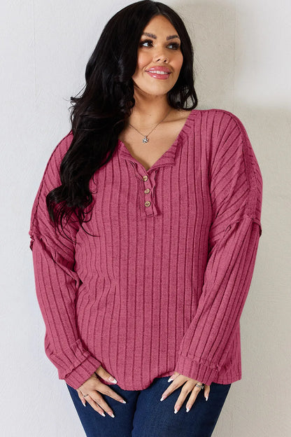Rust-colored Trendsi Basic Bae full-size ribbed long sleeve T-shirt with half button front, showcasing a fitted, casual style.