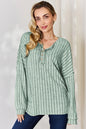 Rust-colored Trendsi Basic Bae ribbed long sleeve T-shirt with half-button front and full size fit.