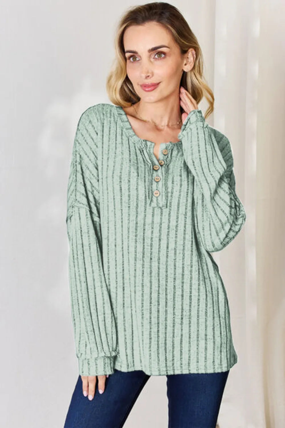 Rust-colored Basic Bae ribbed long sleeve T-shirt with half button front, full size, by Trendsi, shown on a plain background.