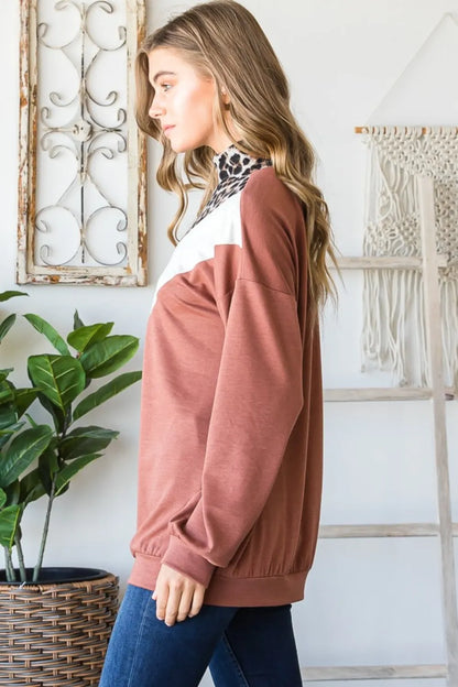 Heimish full-size leopard print quarter zip mock neck sweatshirt in rust color, stylish and comfortable for casual wear.