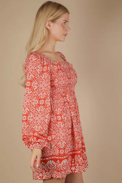 Rust-colored VERY J printed boho mini dress with smocked chest and flowy design, perfect for casual summer wear.