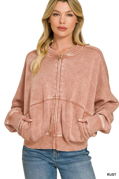 Rust-colored Zenana acid washed fleece jacket with a relaxed fit, featuring a zip-up front and cozy fleece material.